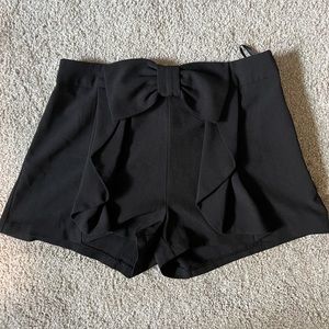 High waisted black bow shorts
